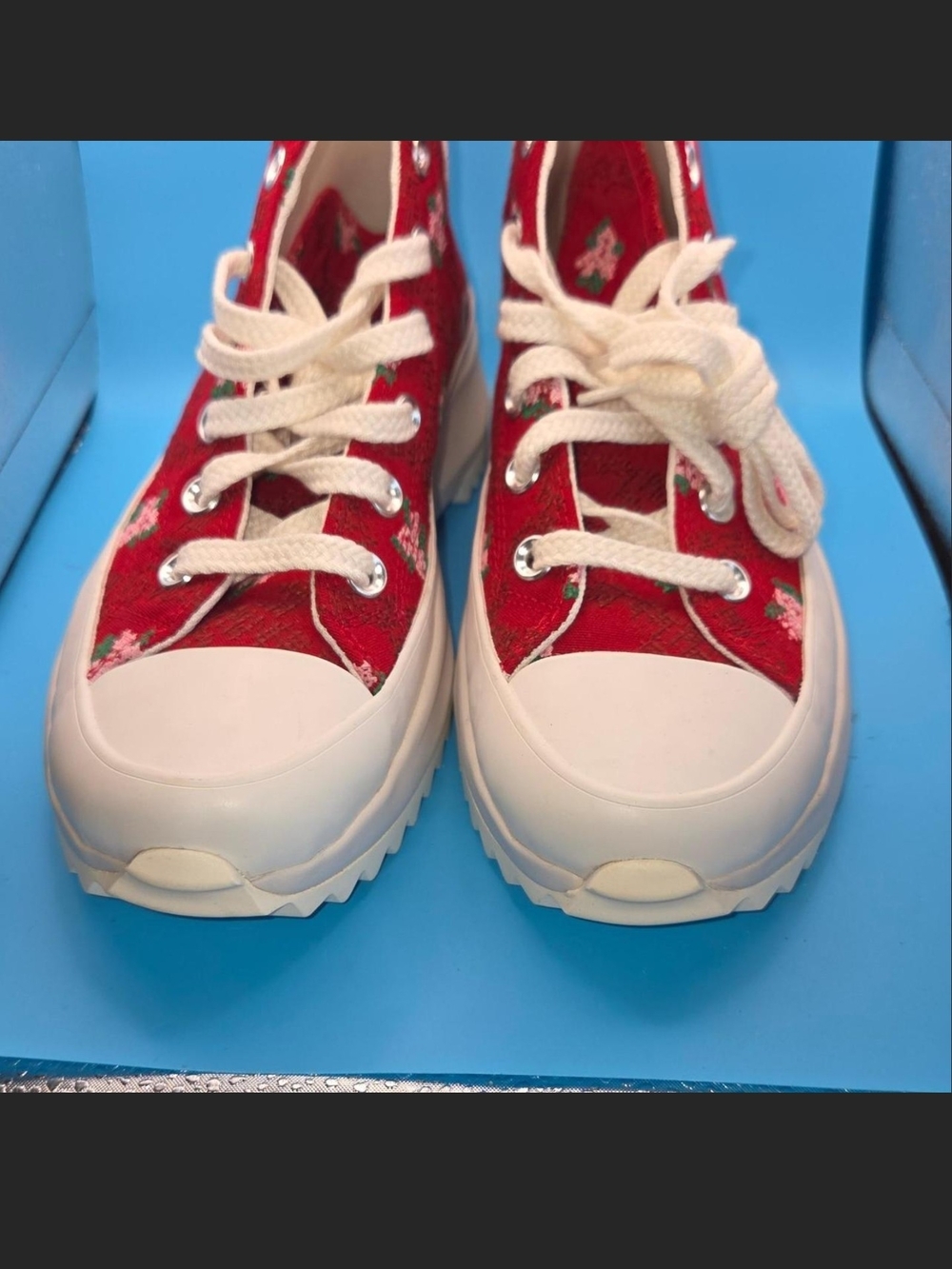 Red Converse Chuck Taylor All Star sneakers with white floral print, WomenUS7.5